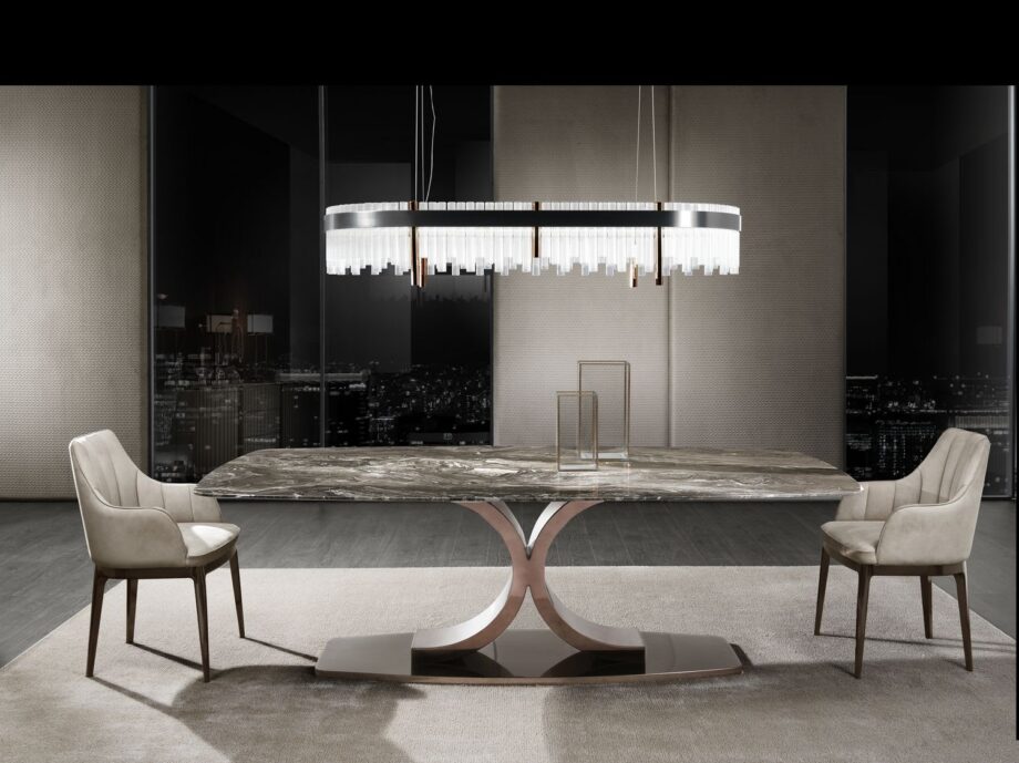 Elite Plaza chandelier | DV home. A luxurious Art Deco chandelier featuring a satin black nickel structure, hexagonal metal columns, and transparent cannetè glass.