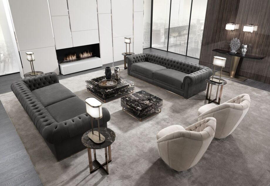 Royal Capitonne' armchair | DV home. Luxurious swivel armchair with exquisite tufted upholstery and a polished steel base.