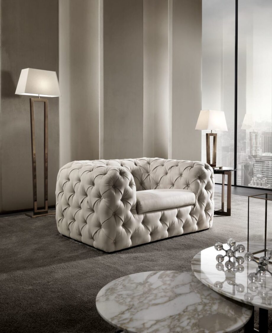 Chelsea armchair | DV home. Luxuriously tufted armchair with a solid wood frame, offering unparalleled comfort and bespoke customization.