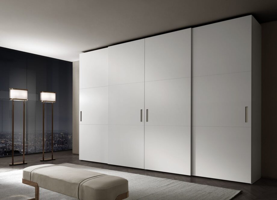 Elite wardrobe | DV home. Custom-made luxury wardrobe with sleek sliding doors and refined material finishes.