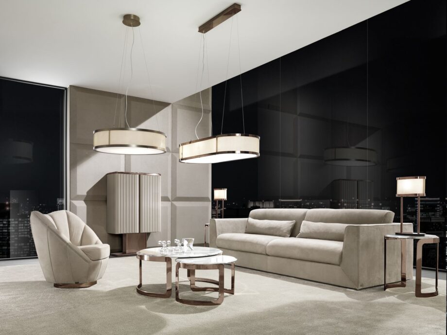 Royal armchair | DV home. Elegant swivel armchair with premium upholstery and a polished stainless steel base.