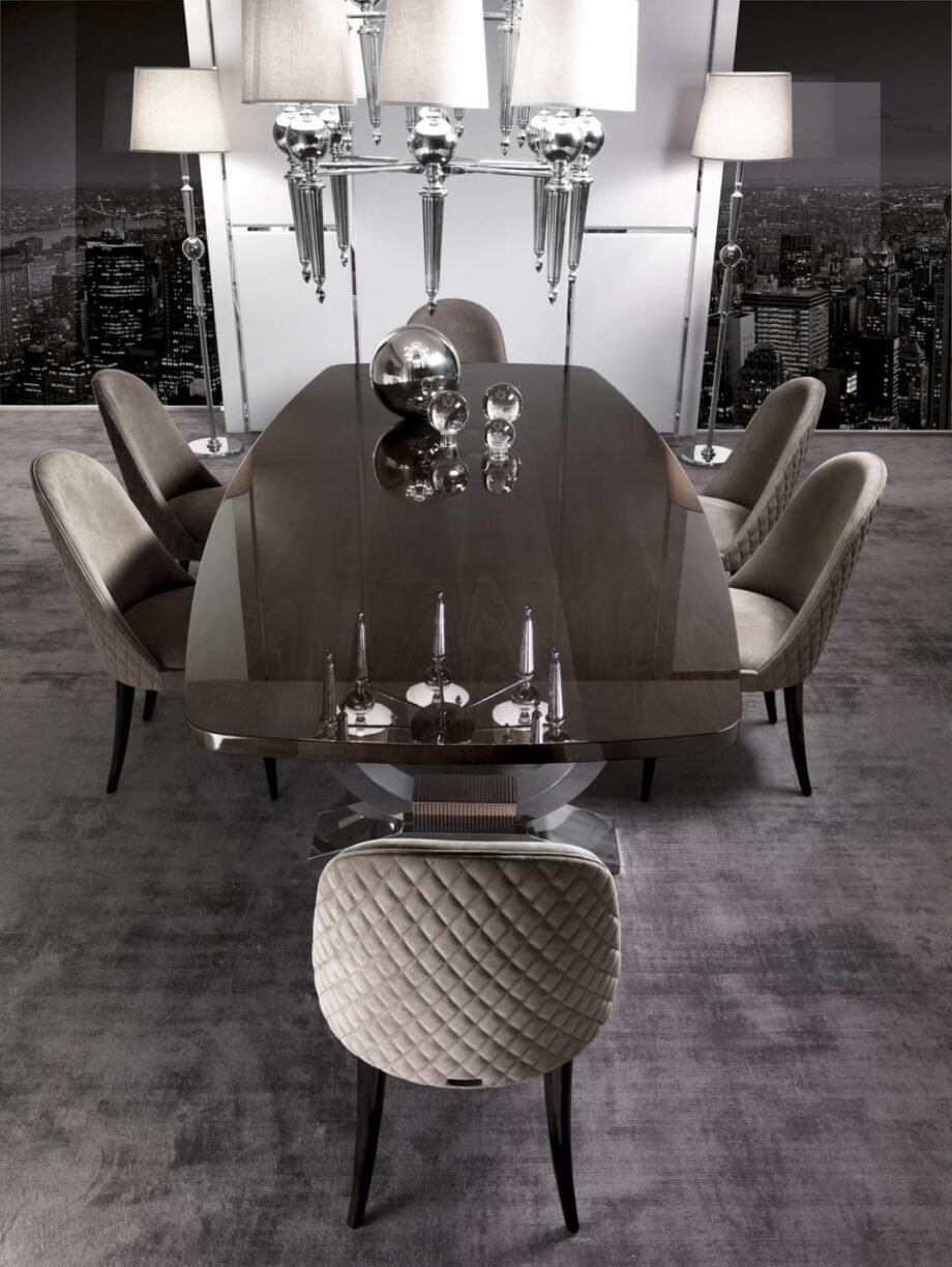 Windsor chair | DV home. Elegant upholstered chair with a distinctive quilted back and refined wooden legs, blending Art Deco luxury with contemporary comfort.