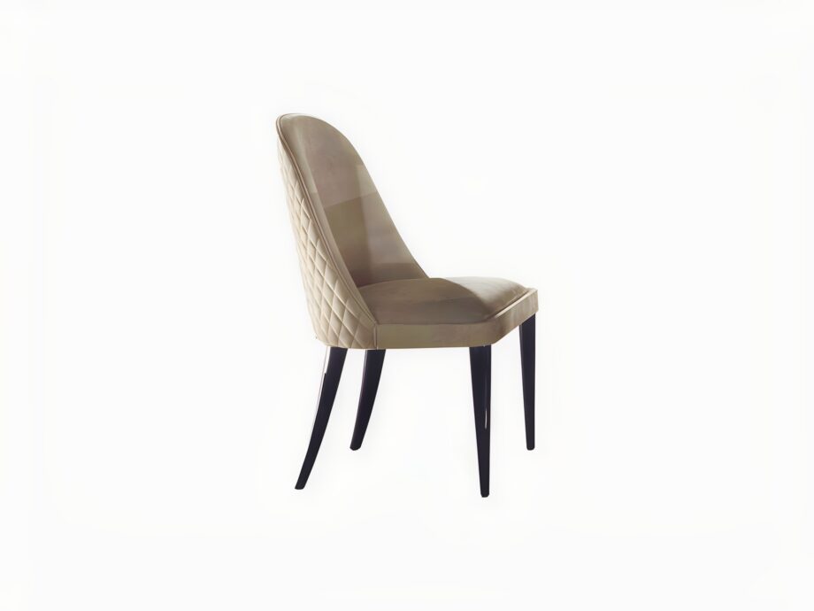 Windsor chair | DV home. Elegant upholstered chair with a distinctive quilted back and refined wooden legs, blending Art Deco luxury with contemporary comfort.