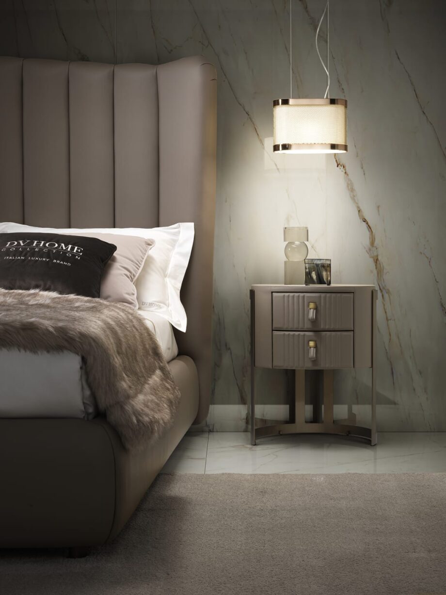 Byron Prince bedside table | DV home. Exquisite Art Deco bedside table featuring leather upholstery, a steel base, and Blumotion drawers.