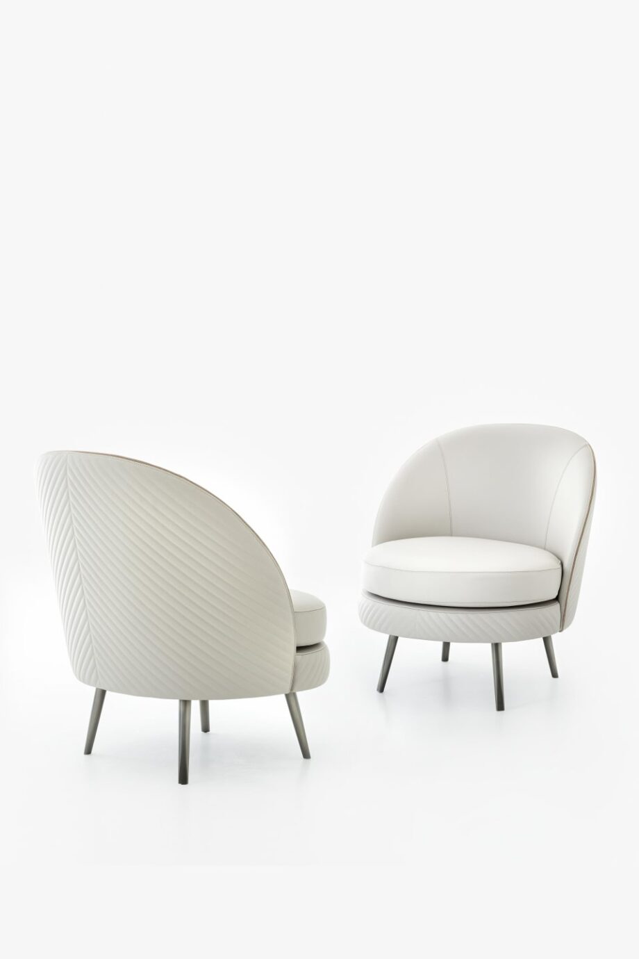 Perla armchair | Rugiano. Elegant upholstered armchair with metal feet, available with patterned stitching, perfect for modern interiors.