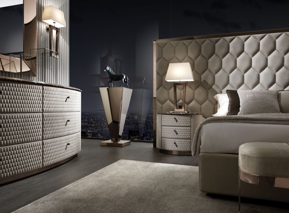 Charlotte bedside table | DV home. Handcrafted luxury night table with hexagon-patterned drawers, premium leather or walnut finishes, and a polished stainless steel base.