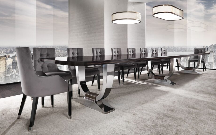 Hermes Suite table | DV home. Grand Art Deco-inspired table with a striking stainless steel base and luxurious lacquered or wood veneer top.