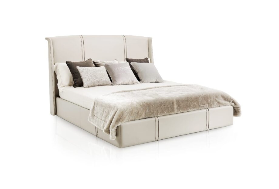 Coco bed | DV home. Luxurious bed with a high upholstered headboard, embodying Art Deco elegance and supreme comfort.