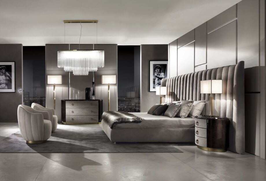 Hermes Maxi bed | DV home. A luxurious bed with a high, tufted headboard, offering unparalleled comfort and sophisticated design for discerning interiors.