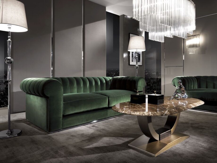 Kent sofa | DV home. Luxurious Italian sofa with goose feather cushions, chrome base, and custom sizing, offering unparalleled comfort and elegant design.