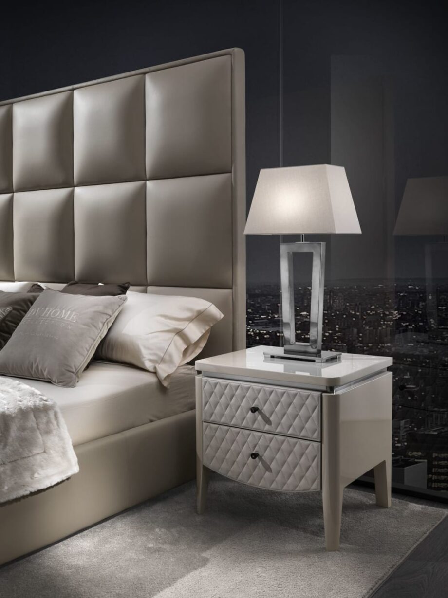 Ritz table lamp | DV home. Elegant Art Deco table lamp with a striking metal base and luxurious fabric shade, perfect for sophisticated interiors.