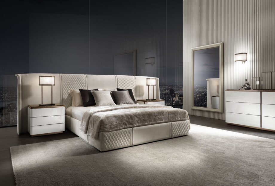 Coco Maxi bed | DV home. Luxurious bed with a high, tufted headboard, offering unparalleled comfort and sophisticated design.