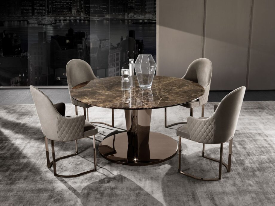 Stanley Round table | DV home. Luxurious Art Deco table with polished stainless steel base and choice of lacquered wood or marble top.