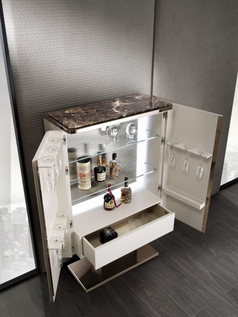 Elite bar cabinet | DV home. Exquisite Art Deco bar cabinet with backlit mirror back, crystal shelves, and luxurious leather upholstery.