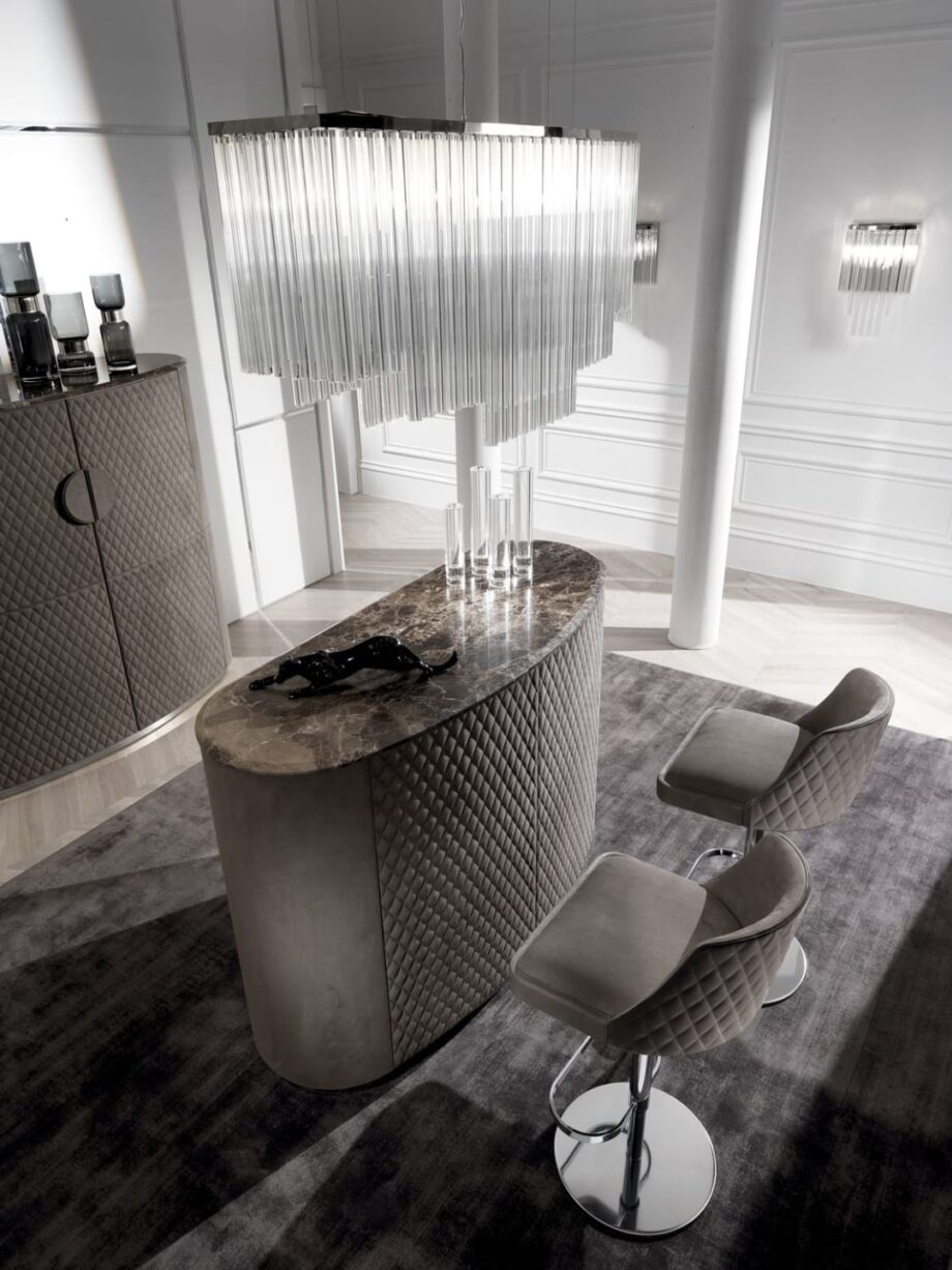 Hermes chandelier | DV home. Exquisite chandelier with polished chrome finish and natural crystals, creating a striking illumination.