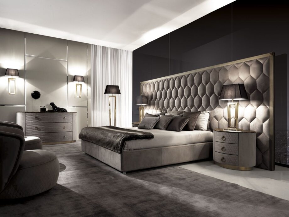 Envy Maxi bed | DV home. Luxurious bed with geometric upholstered high headboard and elegant metallic frame, perfect for high-end interiors.