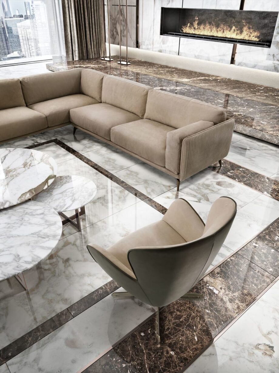 Elite armchair | DV home. Elegant swivel armchair with a chrome base, offering luxurious comfort and contemporary style.