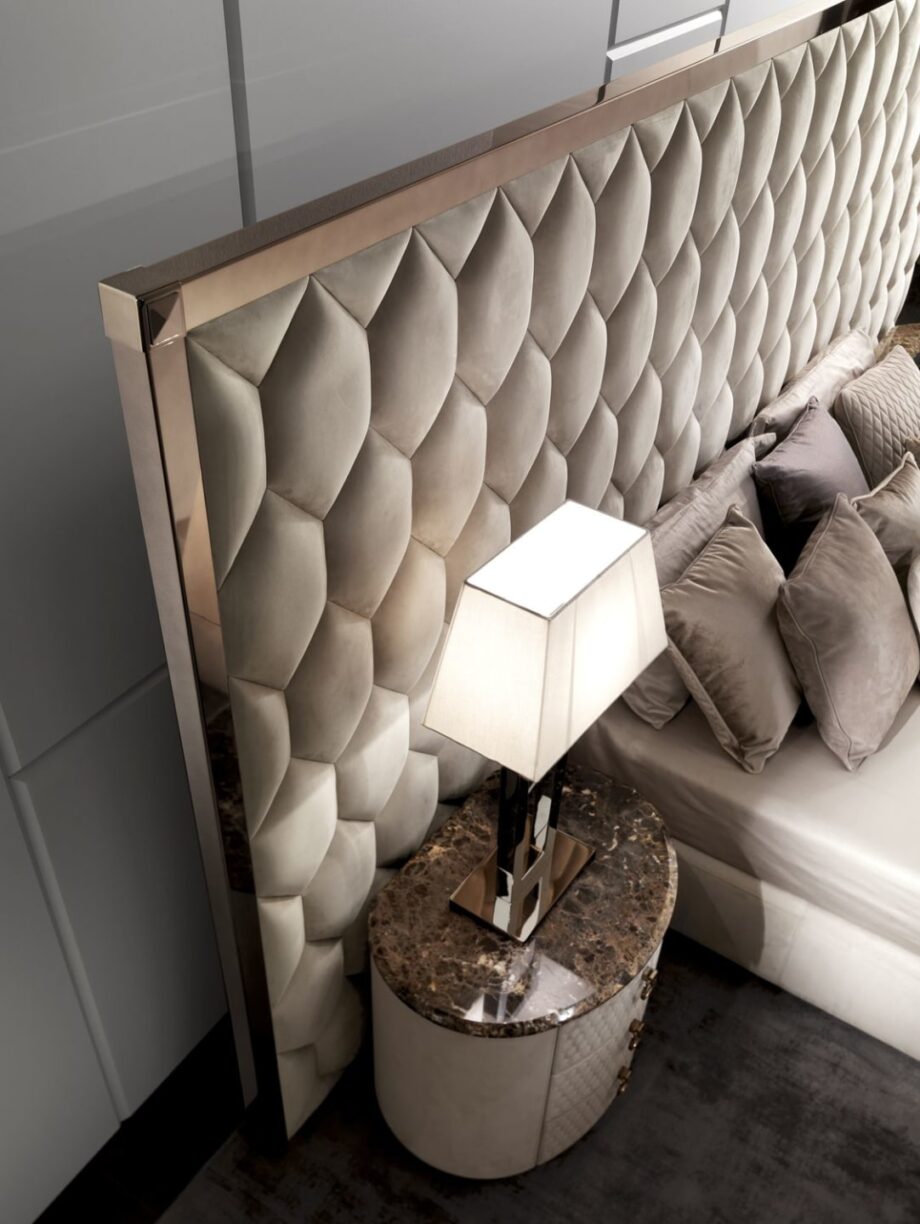 Charlotte bedside table | DV home. Handcrafted luxury night table with hexagon-patterned drawers, premium leather or walnut finishes, and a polished stainless steel base.