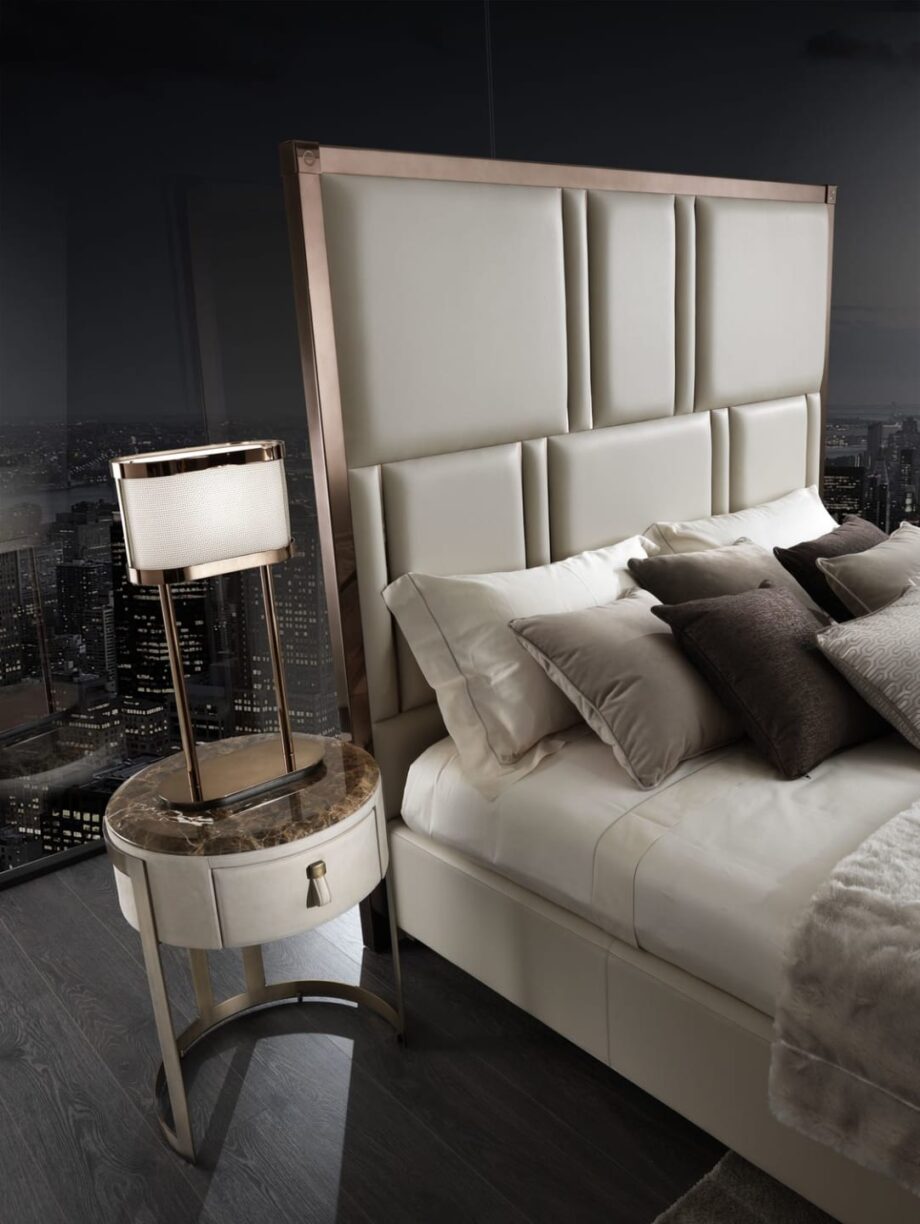 Byron Prince bedside table | DV home. Exquisite Art Deco bedside table, featuring luxurious leather and a striking antique bronze steel base with soft-close drawers.