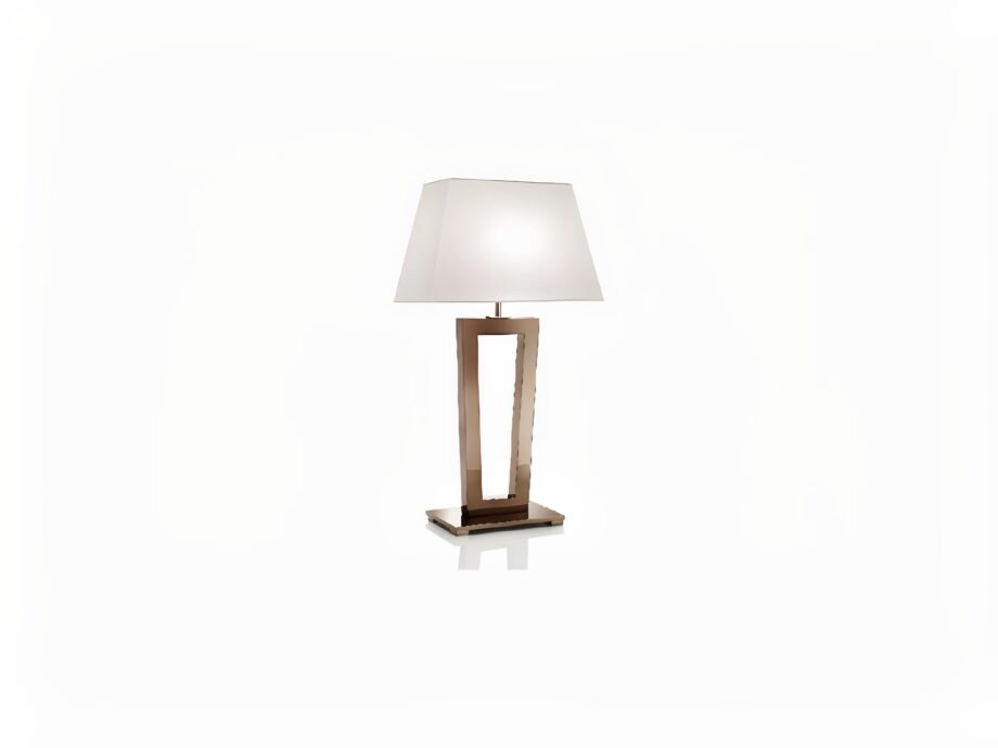 Ritz table lamp | DV home. Elegant Art Deco table lamp with a striking metal base and luxurious fabric shade, perfect for sophisticated interiors.