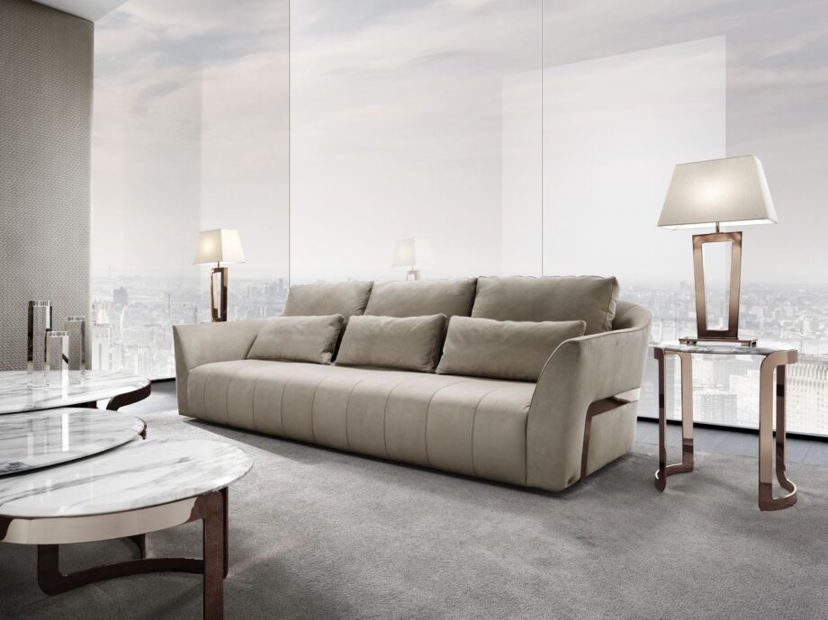 Ritz table lamp | DV home. Elegant Art Deco table lamp with a striking metal base and luxurious fabric shade, perfect for sophisticated interiors.