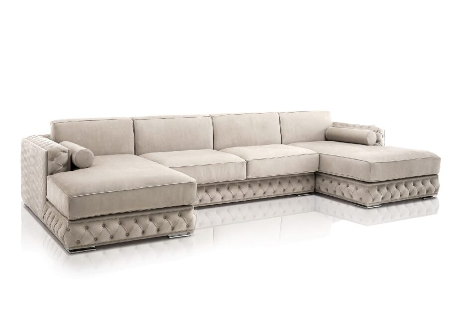 Velvet sofa | DV home. Luxurious Art Deco sofa with tufted upholstery, solid wood frame, goose feather cushions, and chrome feet.