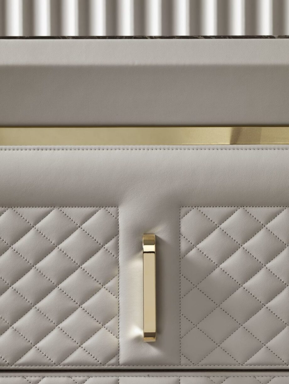 Adler Square display cabinet | DV home. Elegant buffet with marble top, quilted fronts, and metal inserts.