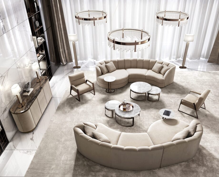 Charlotte Island sofa | DV home. A luxurious, handcrafted sectional sofa with a curved design, perfect for sophisticated living spaces.