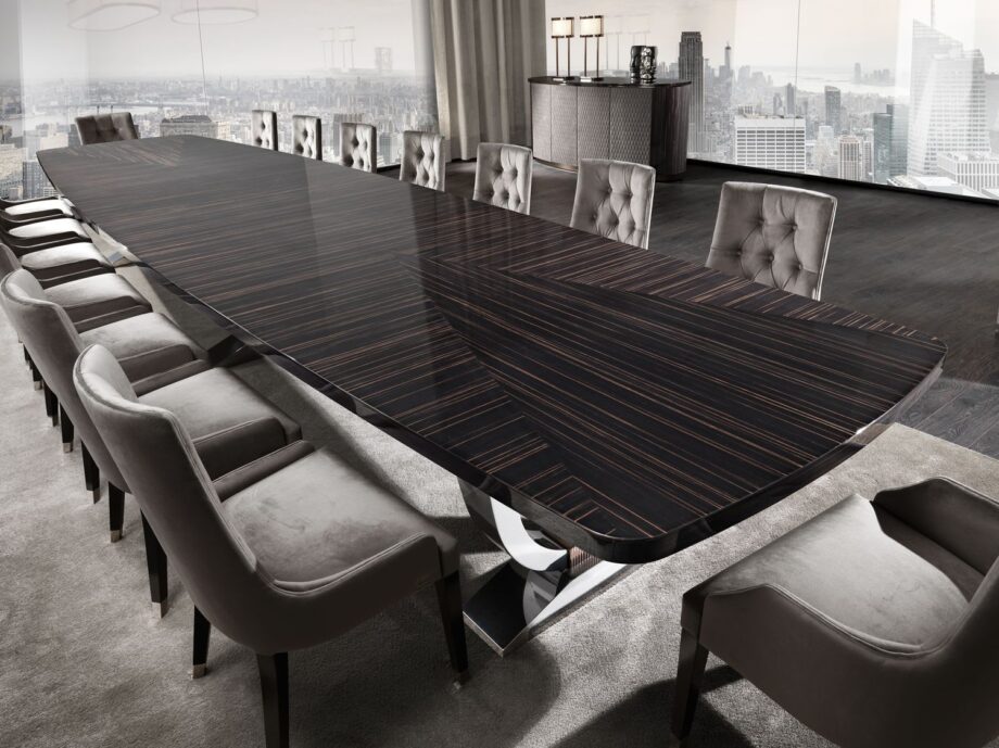 Hermes Suite table | DV home. Grand Art Deco-inspired table with a striking stainless steel base and luxurious lacquered or wood veneer top.