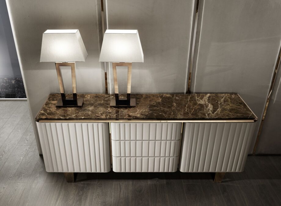 Elite sideboard | DV home. Luxurious Art Deco and Contemporary buffet with fluted design, premium leather/lacquer finishes, marble/walnut top, and stainless steel accents.