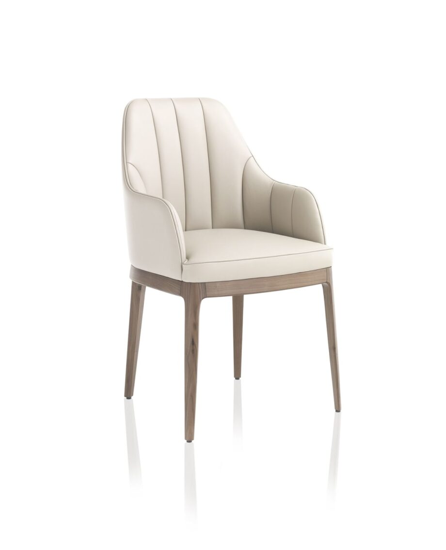 Charlotte chair | DV home. Elegant Italian Art Deco armchair, featuring plush upholstery and a refined wooden base, perfect for luxurious interiors.