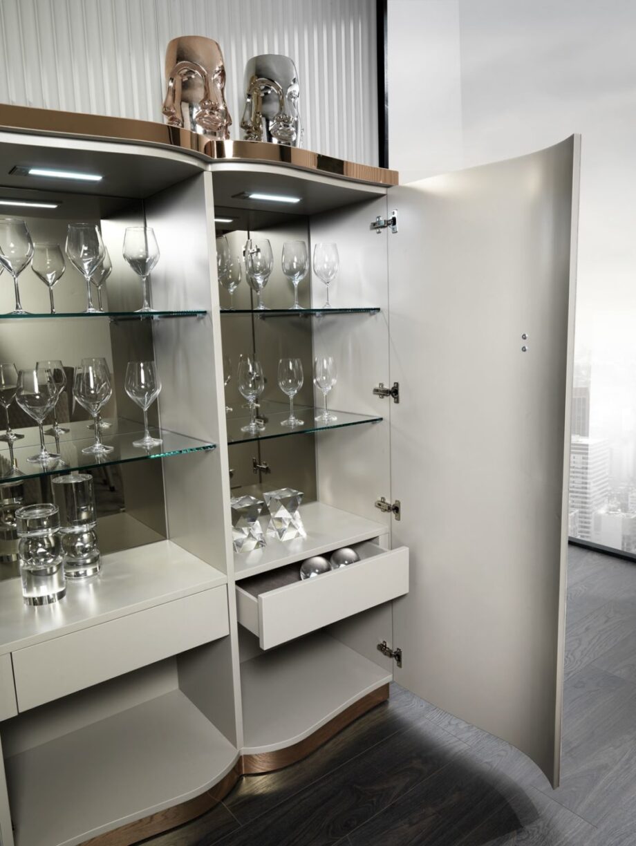 Form bar cabinet | DV home. Luxurious Art Deco cabinet with integrated lighting, mirrored interior, and convenient internal drawers.