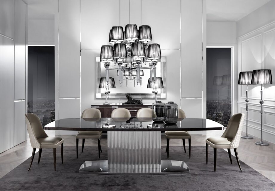 Douglas Plus chandelier | DV home. A luxurious Art Deco chandelier with a gleaming brass or chrome structure and elegant fabric shades, perfect for sophisticated interiors.
