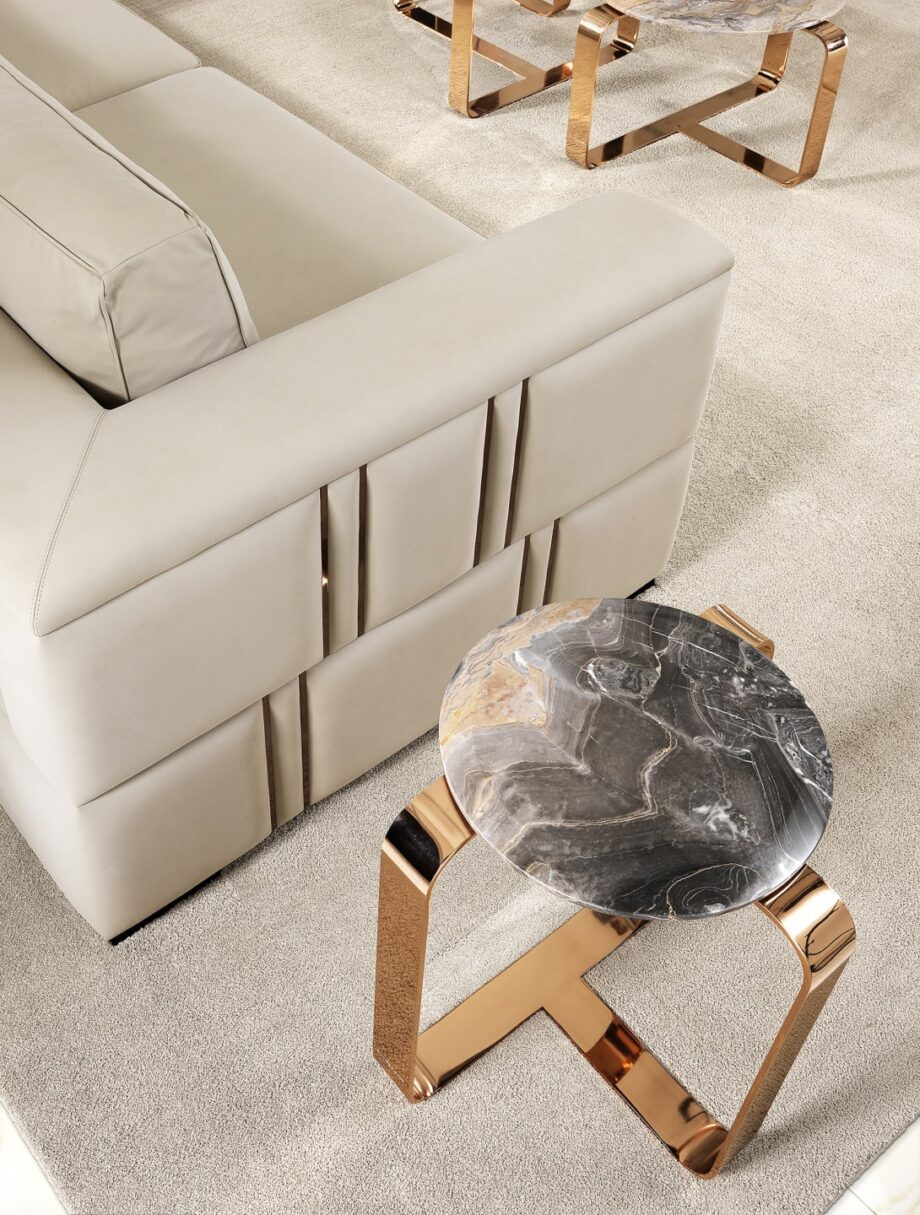 Elite coffee table | DV home. Exquisite designer lamp table featuring a luxurious marble top and a glossy metallic base.