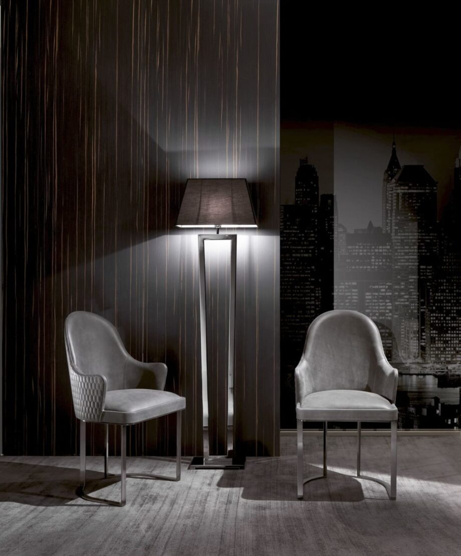 Ritz floor lamp | DV home. An exquisite Art Deco floor lamp with a sleek metal structure and elegant fabric shade, perfect for luxurious interiors.
