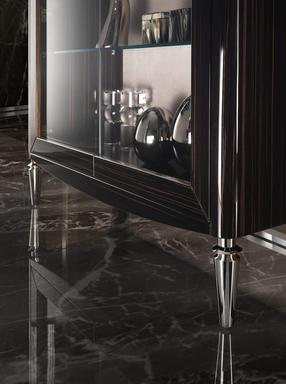 Egoist display cabinet | DV home. Exquisite display case with integrated lighting, crafted from veneered wood and tempered glass, featuring elegant brass details.