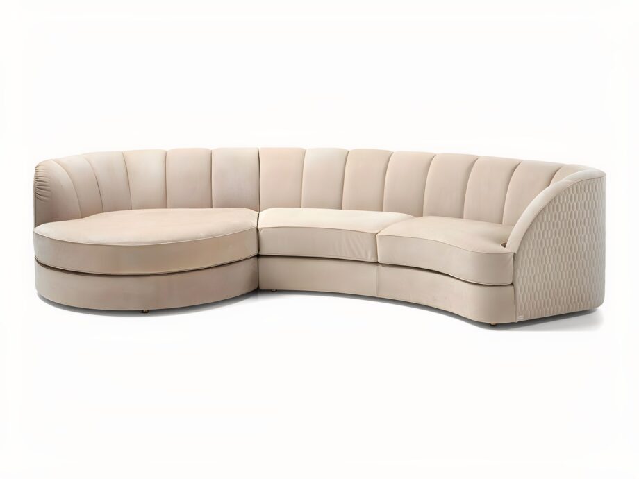 Charlotte Island sofa | DV home. A luxurious, handcrafted sectional sofa with a curved design, perfect for sophisticated living spaces.