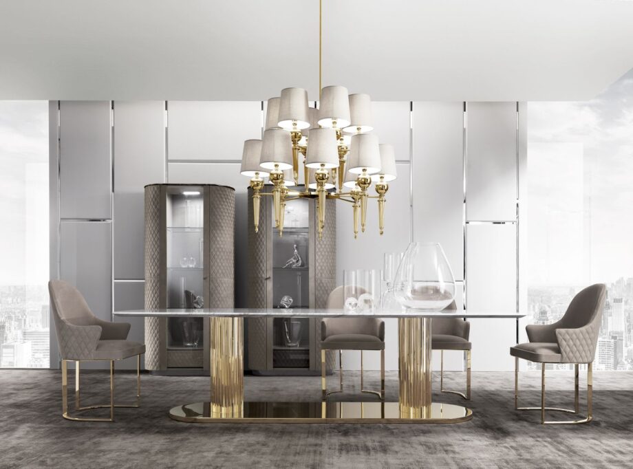 Douglas Suite table | DV home. Exquisite dining table featuring a luxurious marble top and opulent metallic base, perfect for creating a captivating focal point.