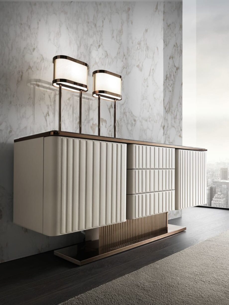 Elite sideboard | DV home. Luxurious Art Deco and Contemporary buffet with fluted design, premium leather/lacquer finishes, marble/walnut top, and stainless steel accents.