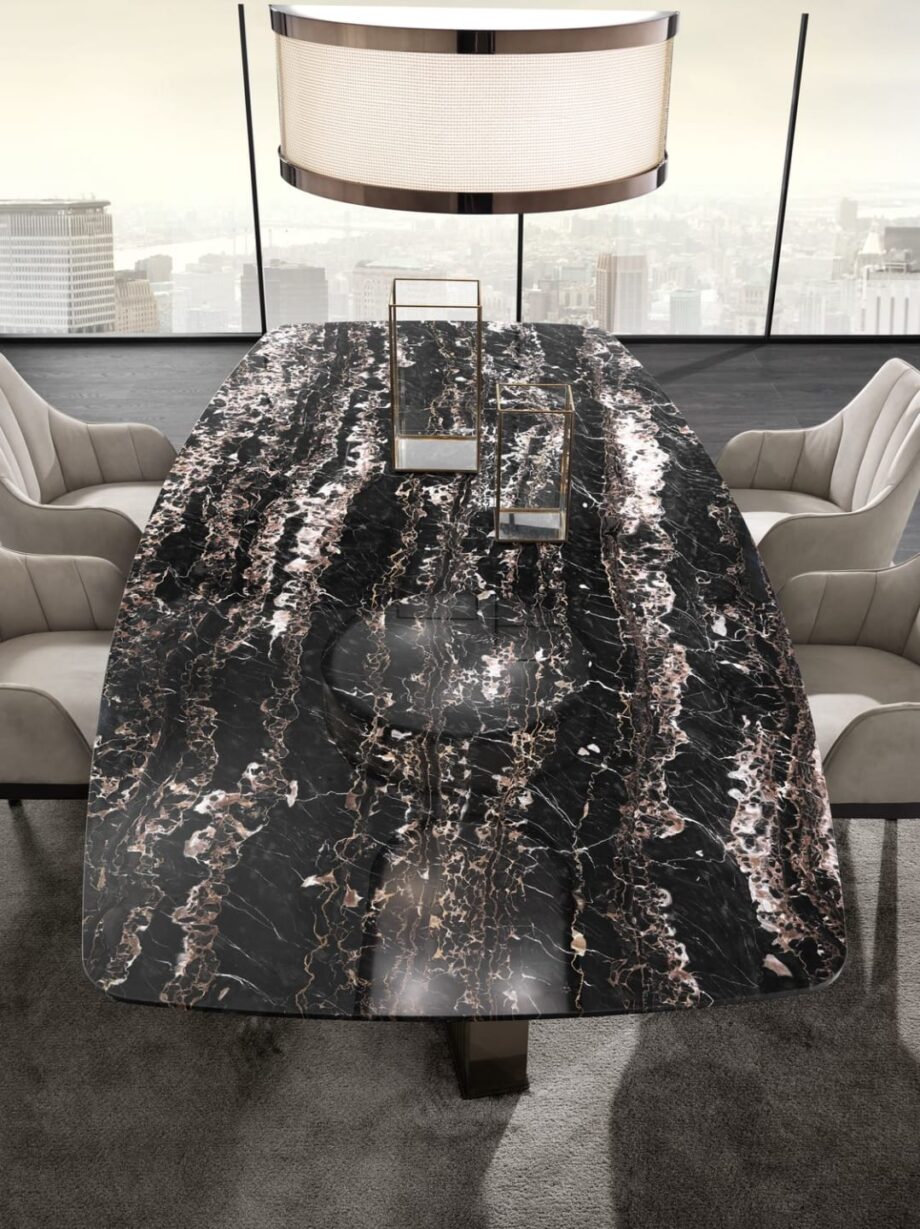 Tiffany table | DV home. Exquisite dining table featuring a luxurious marble top and a distinctive curved stainless steel base, embodying Art Deco elegance.