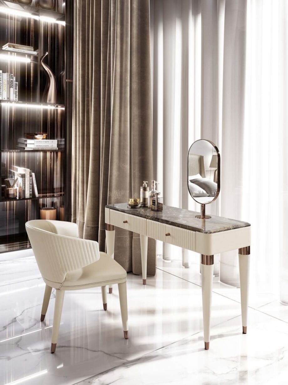 Hollywood chair | DV home. Elegant armchair with curved lines and quilted back, embodying luxury and comfort in contemporary Art Deco style.