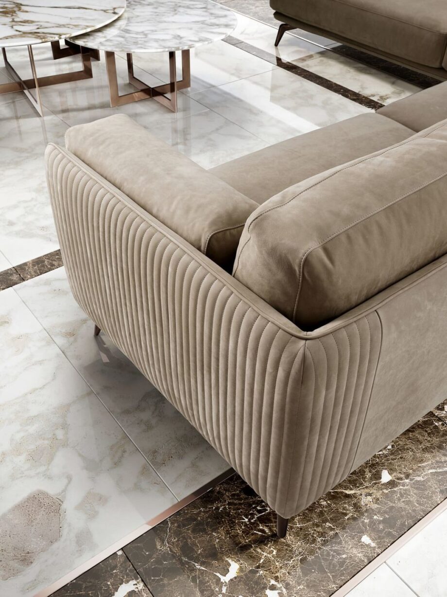 Elite sofa | DV home. Luxuriously crafted sofa with goose feather cushions and elegant metal feet, offering exceptional comfort and sophisticated design.