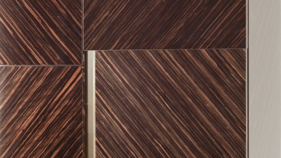 Blade bar cabinet | Rugiano. Elegant bar cabinet with a distinctive geometric patterned facade, perfect for sophisticated interiors.