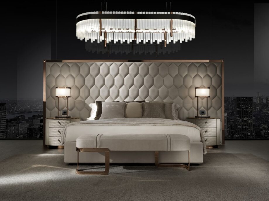 Elite Plaza chandelier | DV home. A luxurious Art Deco chandelier featuring a satin black nickel structure, hexagonal metal columns, and transparent cannetè glass.