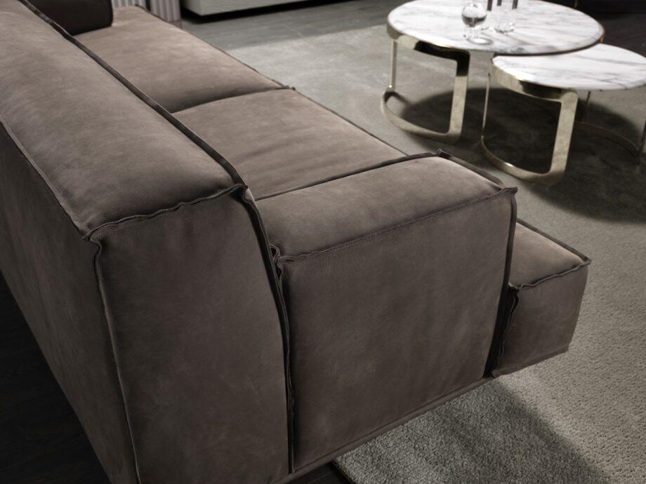 Heritage sofa | DV home. A luxurious Italian sofa with a solid wood frame, premium leather or fabric upholstery, and goose feather cushions.