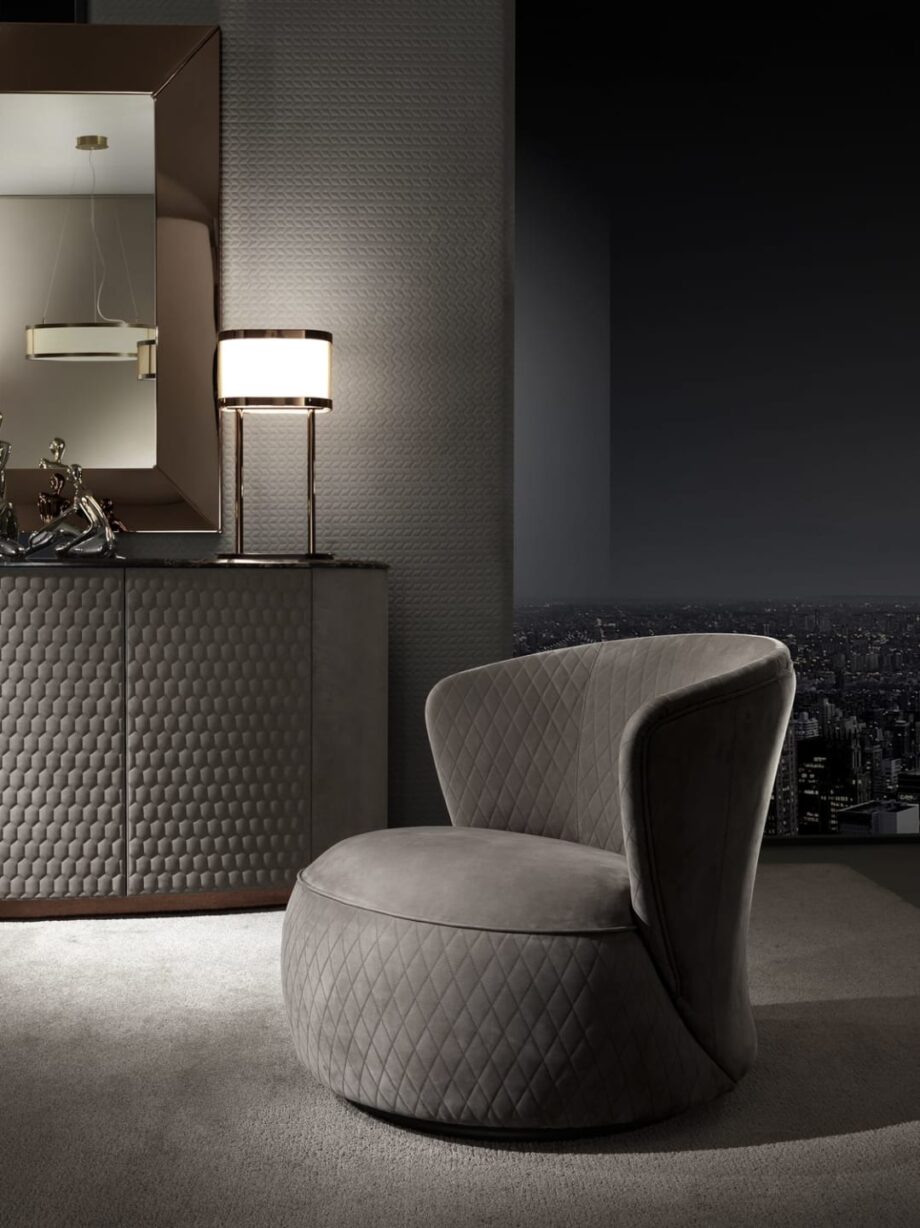 Soho armchair | DV home. Luxurious swivel armchair with distinctive quilted processing, handcrafted in Italy for supreme comfort and Art Deco elegance.