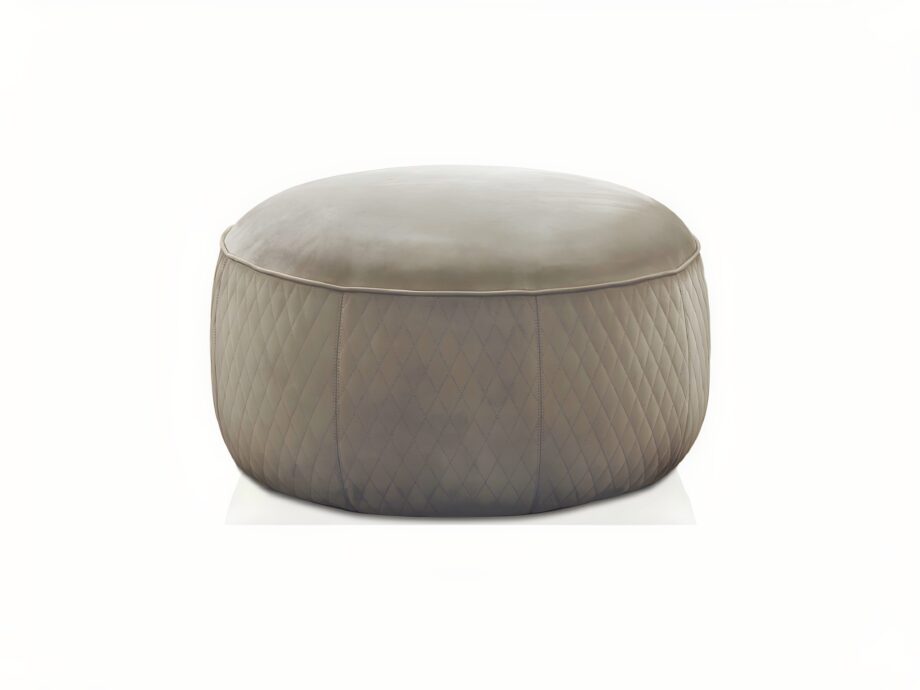 Soho pouf | DV home. Luxurious round pouf with exquisite quilted upholstery, offering a blend of comfort and Art Deco elegance.