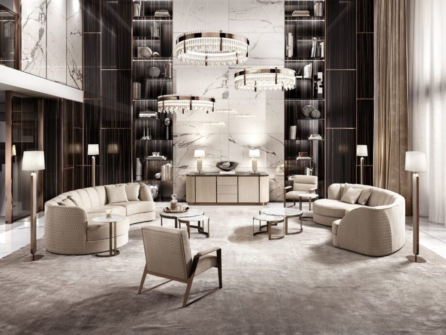 Charlotte Island sofa | DV home. A luxurious, handcrafted sectional sofa with a curved design, perfect for sophisticated living spaces.