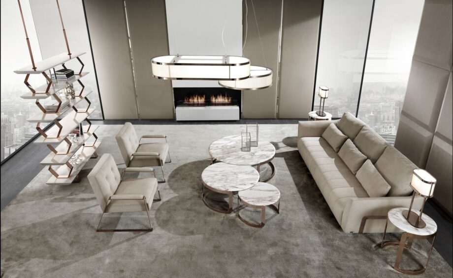 Ritz sofa | DV home. Luxurious custom upholstered sofa with elegant steel frame and plush goose feather cushions, epitomizing Art Deco sophistication.