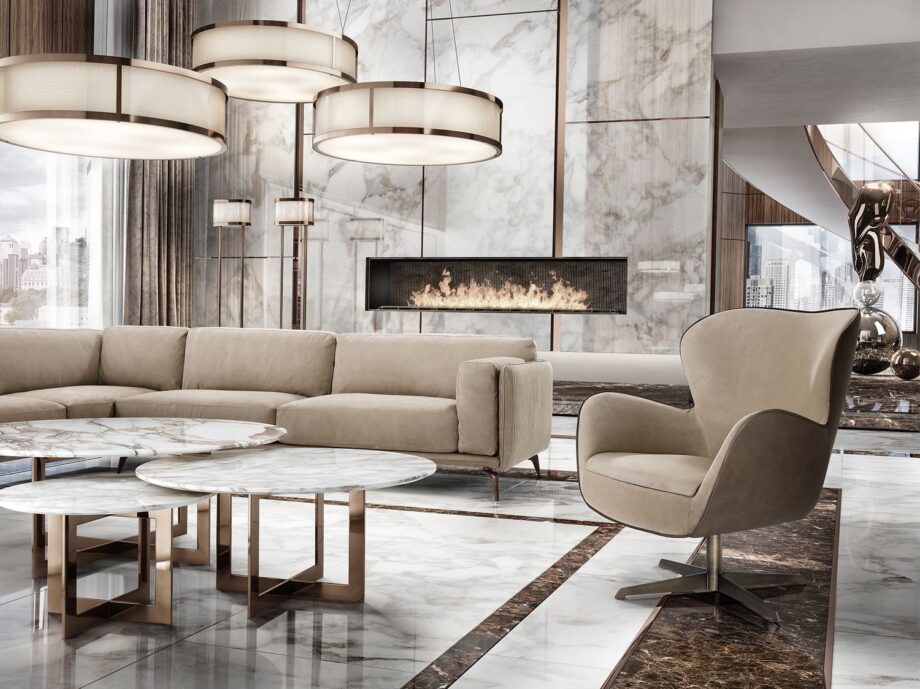 Elite armchair | DV home. Elegant swivel armchair with a chrome base, offering luxurious comfort and contemporary style.
